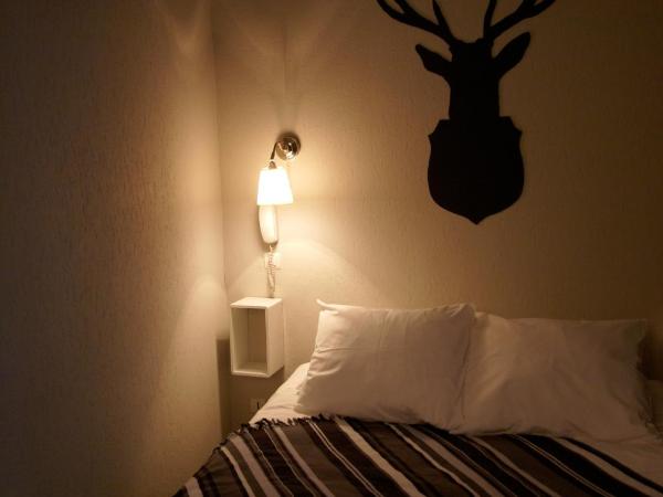 Hotel de la Placette Barcelonnette : photo 10 de la chambre chambre triple