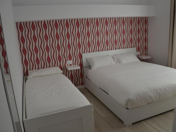 In Centro Glam : photo 5 de la chambre chambre triple