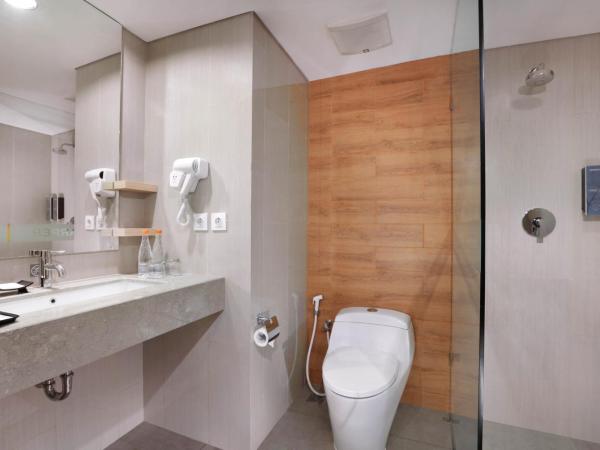 Harper MT Haryono by ASTON : photo 5 de la chambre chambre deluxe double ou lits jumeaux