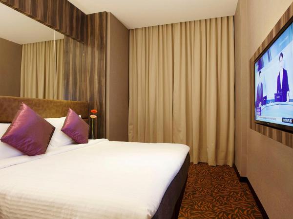Aqueen Hotel Paya Lebar : photo 2 de la chambre chambre deluxe double ou lits jumeaux