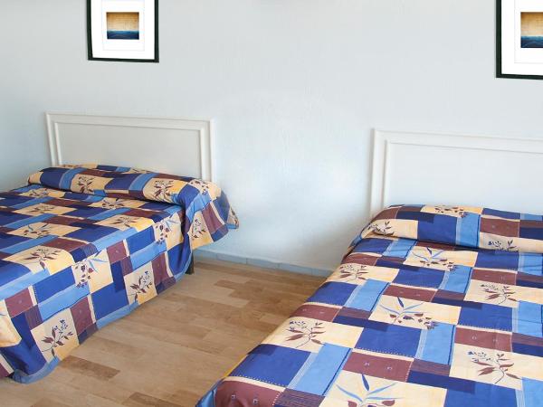 Dorados Acapulco : photo 3 de la chambre chambre quadruple