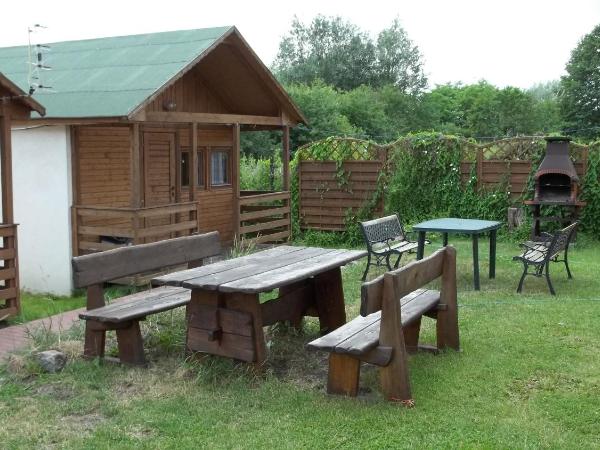 Camping domki letniskowe : photo 10 de la chambre cottage - vue sur jardin