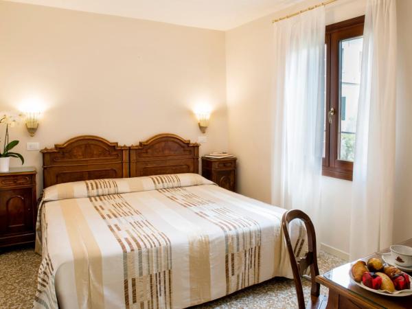 Hotel Agli Alboretti : photo 1 de la chambre chambre triple