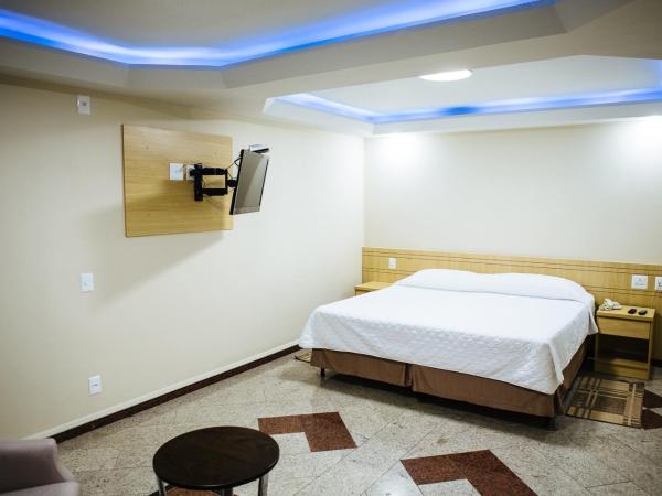 Elegance Praia Hotel : photo 10 de la chambre suite avec jacuzzi