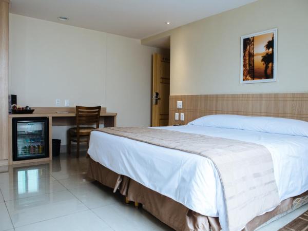 Elegance Praia Hotel : photo 9 de la chambre chambre supérieure