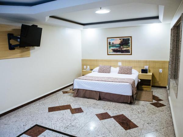 Elegance Praia Hotel : photo 9 de la chambre suite avec jacuzzi