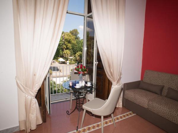 Napoli Milionaria B&B : photo 5 de la chambre chambre triple - vue sur jardin