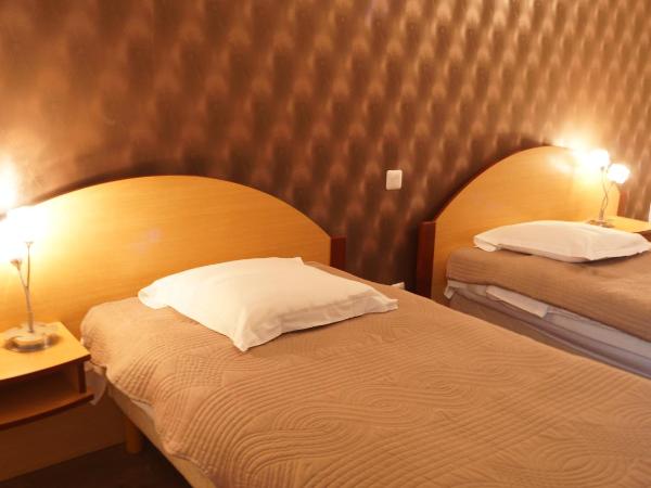 Hotel Restaurant Les Arcades : photo 1 de la chambre chambre double ou lits jumeaux