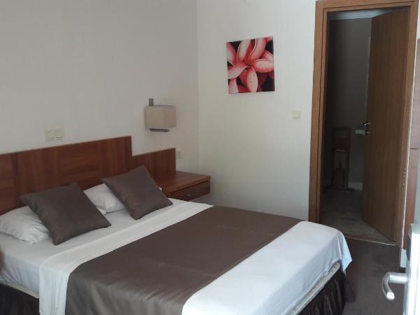 Melis Hotel Kusadasi : photo 6 de la chambre chambre double - vue sur jardin - annexe