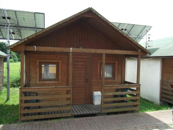 Camping domki letniskowe : photo 9 de la chambre cottage - vue sur jardin