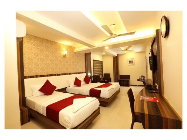 Hotel Kochi Caprice : photo 2 de la chambre chambre triple deluxe