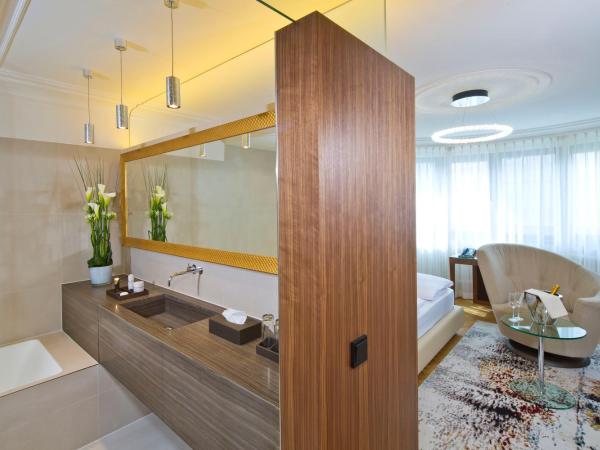 Hotel Maximilian - Stadthaus Penz : photo 2 de la chambre suite junior stadthaus – réservée aux adultes