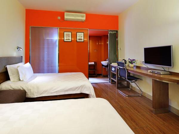 Yanjiang East Garden Inn : photo 3 de la chambre chambre affaires lits jumeaux