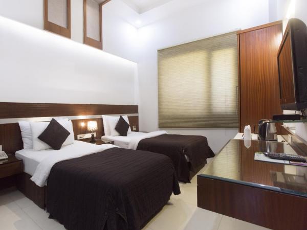 Hotel Krishna - By RCG Hotels : photo 1 de la chambre chambre deluxe double ou lits jumeaux