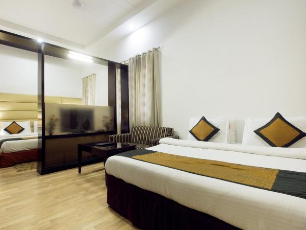 Hotel Krishna - By RCG Hotels : photo 8 de la chambre chambre familiale