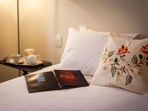 Pousada Casa da Vitória : photo 3 de la chambre chambre double supérieure