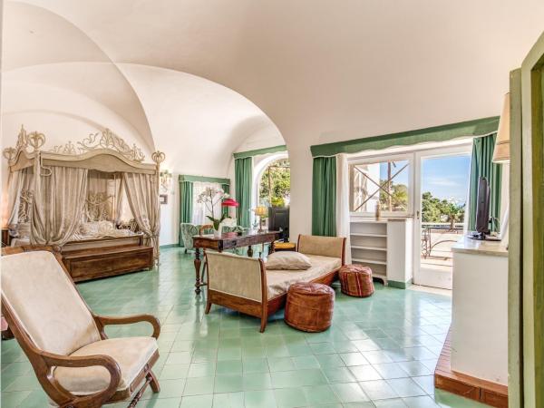Villa Calypso : photo 2 de la chambre suite junior lit king-size avec terrasse