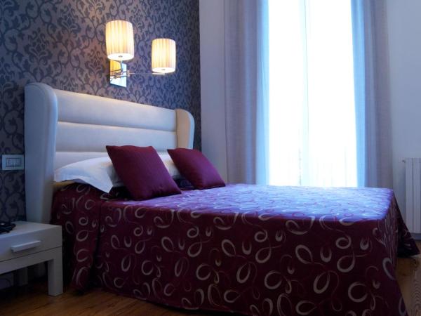 Hotel Aspromonte : photo 1 de la chambre suite avec baignoire spa