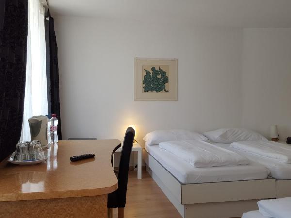 Spalenbrunnen Hotel & Restaurant Basel City Center : photo 1 de la chambre chambre quadruple