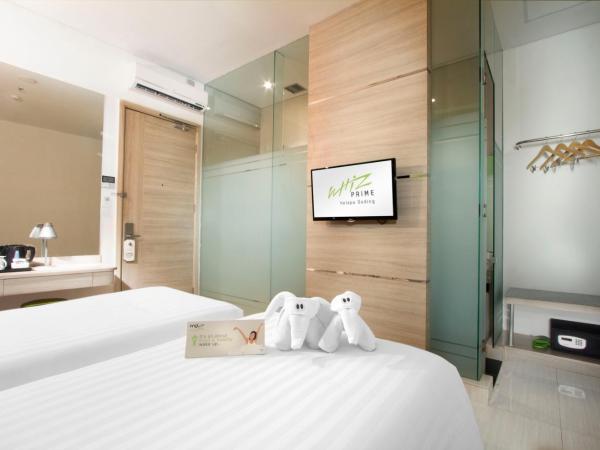 Whiz Prime Hotel Kelapa Gading : photo 1 de la chambre chambre lits jumeaux supérieure