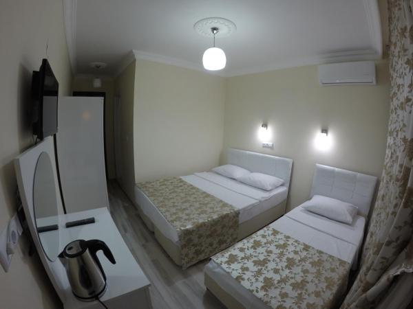 Pınar Vintage House : photo 5 de la chambre chambre lits jumeaux avec salle de bains