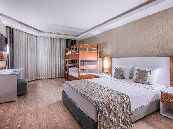 Palm Wings Ephesus Beach Resort - Ultra All Inclusive : photo 1 de la chambre  studio (2 adultes + 2 enfants) - vue sur terres