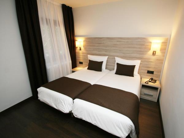 Hotel Pyrénées : photo 10 de la chambre chambre double ou lits jumeaux