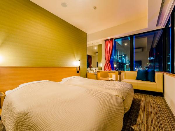 Candeo Hotels Fukuoka Tenjin : photo 2 de la chambre corner twin room with city view - non-smoking