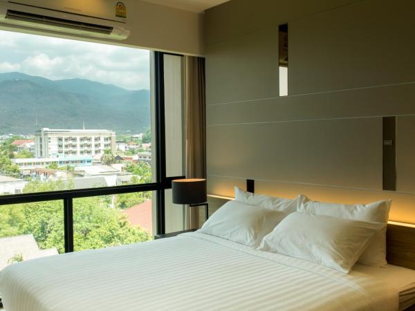 Hyde Park Chiangmai : photo 3 de la chambre grande suite ville