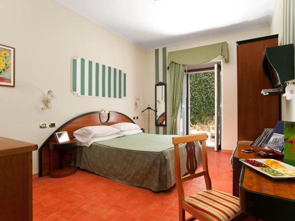 Hotel Prestige : photo 1 de la chambre chambre triple