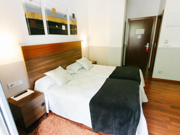 Hostal San Ignacio Centro : photo 5 de la chambre chambre double ou lits jumeaux donnant sur l’intérieur