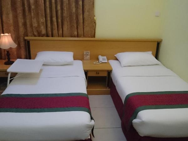 Muscat International Hotel : photo 5 de la chambre chambre lits jumeaux