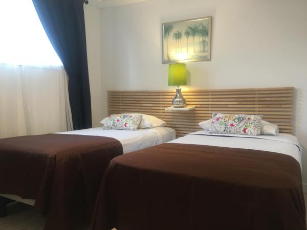 The Inn on College : photo 9 de la chambre chambre lits jumeaux Économique