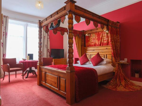Royal Exeter Hotel : photo 1 de la chambre chambre double avec lit à baldaquin