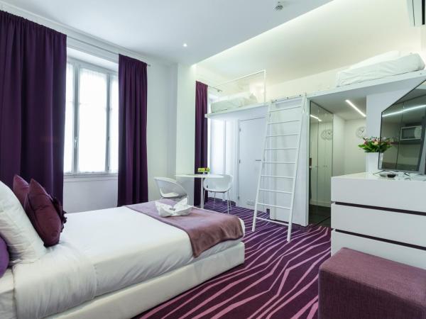 Nice Appart : photo 7 de la chambre studio en duplex (4 adultes) - vue sur jardin