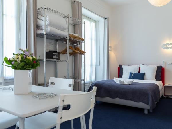 Nice Appart : photo 8 de la chambre studio familial – vue sur jardin (4 adultes)