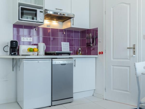 Nice Appart : photo 7 de la chambre studio familial – vue sur jardin (4 adultes)