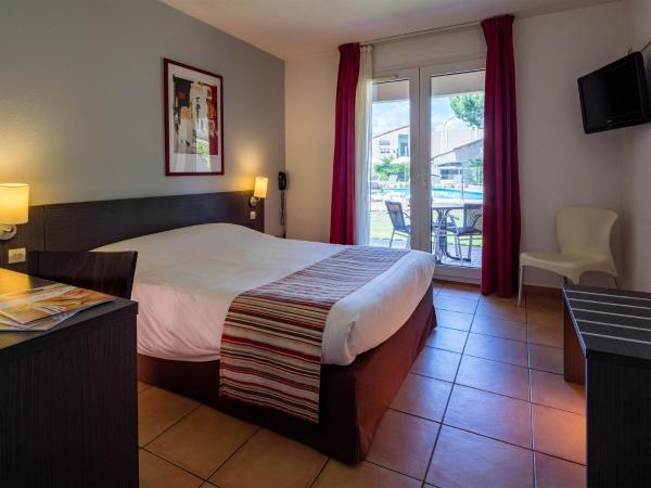 Noemys Aigues-Mortes - Hotel avec piscine : photo 3 de la chambre chambre double ou lits jumeaux avec terrasse