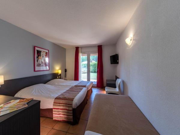 Noemys Aigues-Mortes - Hotel avec piscine : photo 2 de la chambre chambre triple avec terrasse