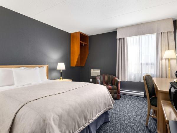 Travelodge by Wyndham Edmonton West : photo 4 de la chambre chambre lit queen-size deluxe - non-fumeurs