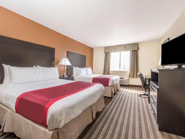 Days Inn & Suites by Wyndham Dallas : photo 1 de la chambre chambre avec 2 grands lits queen-size