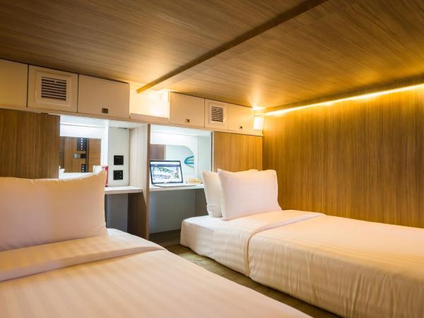 Nonze Hostel : photo 4 de la chambre suite lits jumeaux capsule avec salle de bains commune
