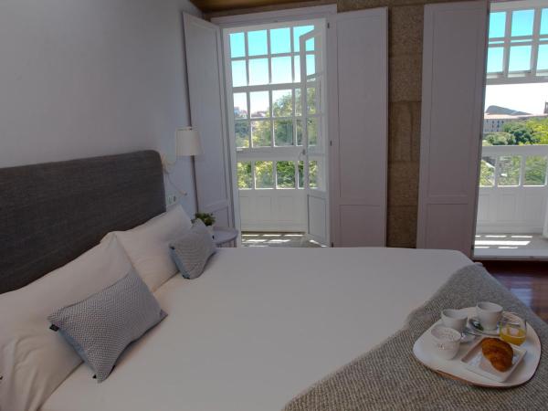 Pensión O Xardin de Julia : photo 4 de la chambre chambre double - vue sur jardin