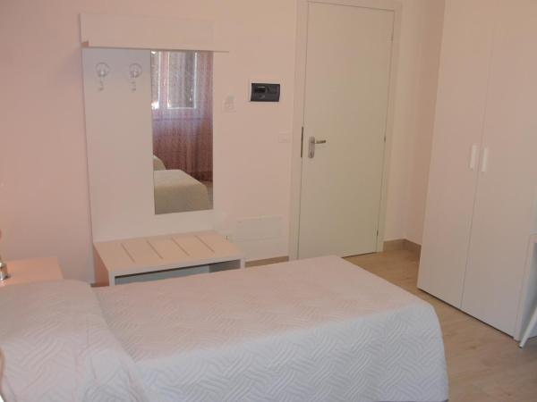 Affittacamere La Perla : photo 5 de la chambre chambre double ou lits jumeaux
