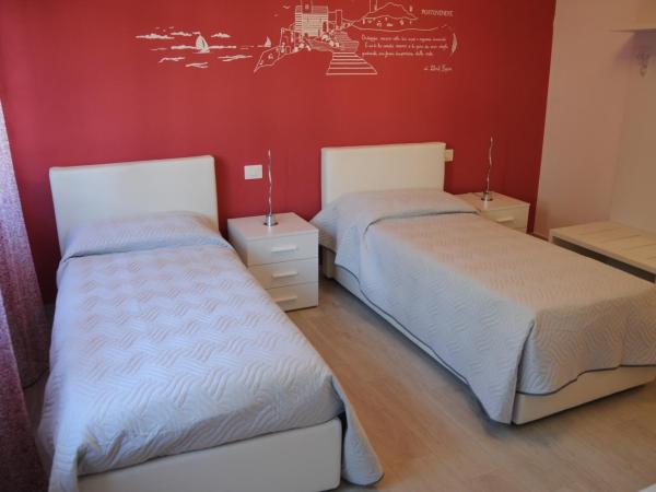 Affittacamere La Perla : photo 3 de la chambre chambre double ou lits jumeaux