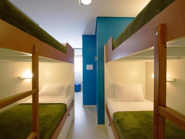 Brazilodge All Suites Hostel : photo 6 de la chambre lit simple dans dortoir pour hommes de 8 lits avec salle de bains privative