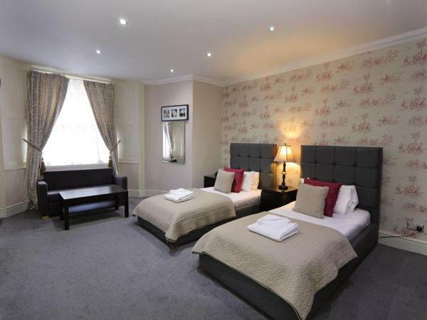 Palmerston Suites : photo 2 de la chambre chambre lits jumeaux deluxe