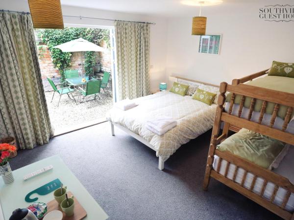 Southville Guest House : photo 1 de la chambre chambre familiale deluxe