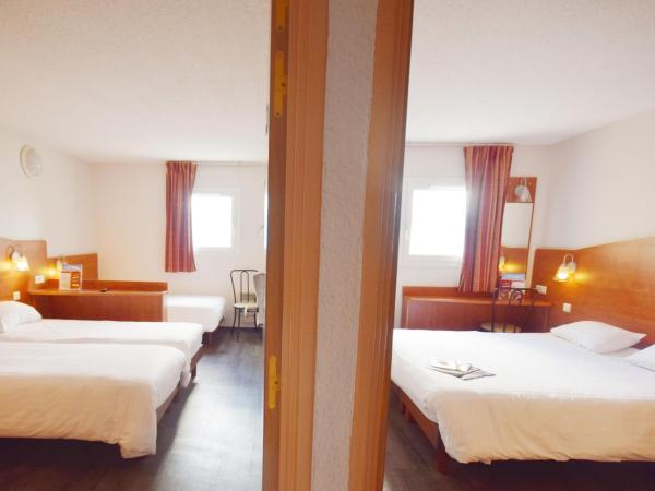 Brit Hotel Reims La Pompelle : photo 1 de la chambre 2 chambres communicantes