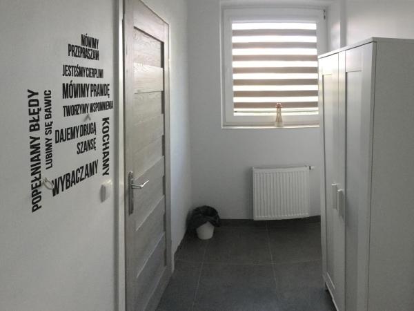 Panorama Gdynia Rooms : photo 9 de la chambre chambre quadruple - vue sur jardin